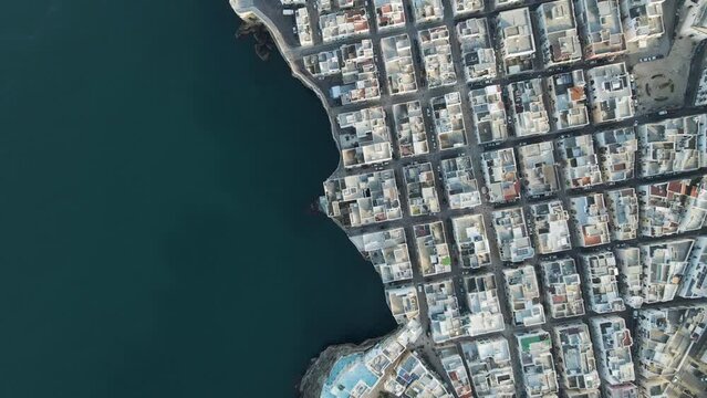 Aerial view of Polignano a Mare old town, a small city along the coast facing the Mediterranean Sea, Bari, Puglia, Italy.