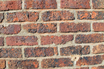 mur de briques rouge en gros plan avec texture
