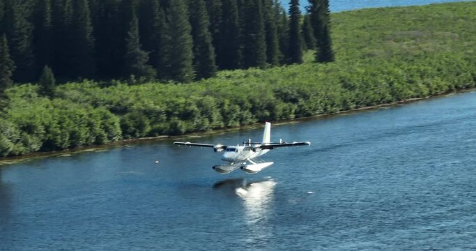 Incredible tracking shot following a seaplane landing on a river in Labrador, Canada