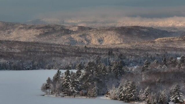 Monson Lake woodland landscape covered in Winter snowfall