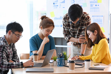 Start up business team brainstorming for important project in modern corporate office