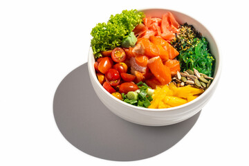 Salmon poke bowl cut out on white background with long shadow.