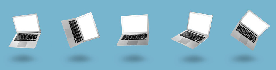 Fototapeta na wymiar Collage of modern laptop with blank screen on blue background