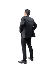 Obraz na płótnie Canvas Rear view of Asian businessman standing