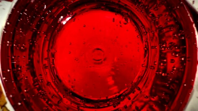 Close Up Bubbles On Red Champagne Carbonated Alcoholic Drink Top Down Overhead