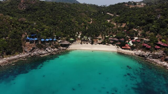 Pan to Aew Leuk Beach at Koh Tao in wonderful Thailand, filmed with a Drone