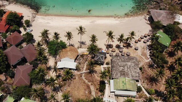 Amazing view of the horizon at wonderful Aew Leuk Beach at Koh Tao in Thailand, filmed with a Drone.