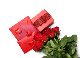 Red roses with envelopes and hearts on white background. Valentine's Day celebration
