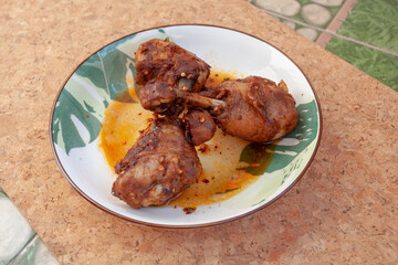 Thai food, chicken leg with mala sauce