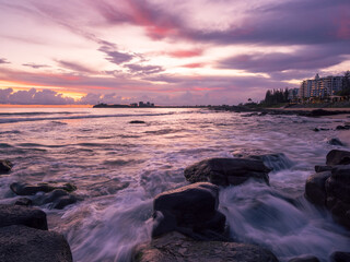 Coastal Sunrise with Waves Crashing