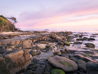 Seaside Sunrise with Pink Cloud and Rocks
