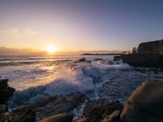 Coastal Sunrise with Waves Crashing