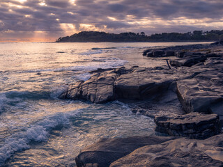 Coastal Sunrise with Waves Crashing