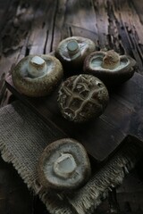 shitake mushrooms on a wooden tray