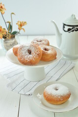 Sweet homemade donuts with sugar powder 