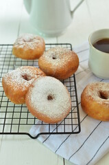 Sweet homemade donuts with sugar powder 