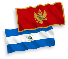 National vector fabric wave flags of Nicaragua and Montenegro isolated on white background. 1 to 2 proportion.