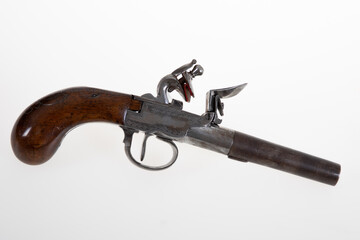 Firearm from american revolution and antique collectables gun dueling flintlock pistols on white...