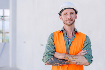 portrait smart confident arm crossed engineer construction worker builder home renovate service man