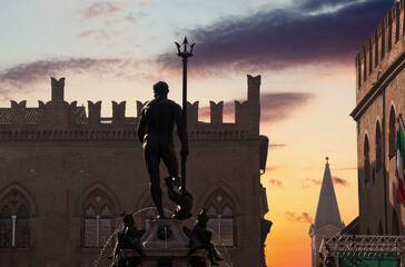 The Fountain of Neptune in Bologna at dawn. Italy