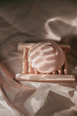 Natural Skincare soap on a wooden stand for natural, eco friendly, simple and minimalistic skincare brand