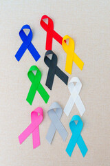 World cancer day, February 4. Colorful ribbons for supporting people living and illness. Healthcare, fighting, medical and National Cancer Survival day, Autism awareness day concept
