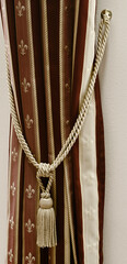 detail of a luxury curtain with tassel