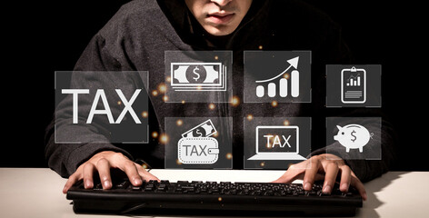 Success Businessman use laptop computer with complete income paying taxes receipt online for payment calculation tax return and financial research at home.TAX and VAT Time concept