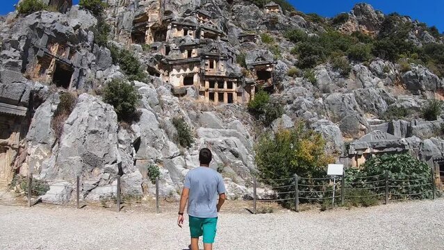 Tourist discovering the wonderful ruins of Myra in Turkey