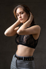 The girl is dressed in a black top.