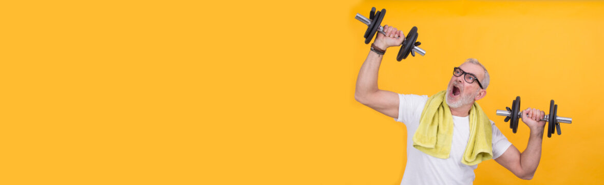 man working out with dumbbells with copy space