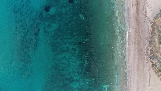 bird's-eye view of the sea and beach with drone