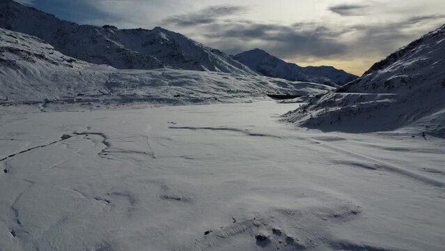 Winter view of Lake Montespluga in the Italian alps
