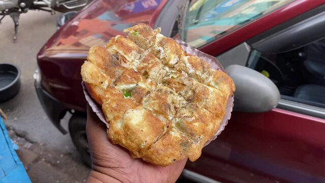 Close up shot of bread omelette, which is a quick and easy breakfast from India at daytime.