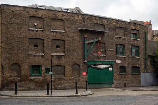 LONDON, UK - SEPTEMBER 09, 2018:   Old Victorian Warehouse on Plumbers Row in the East End