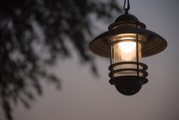 Lamps shine brightly at night.