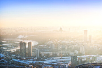 Obraz premium View of the city from the observation deck and Moscow State University in the haze, Moscow City