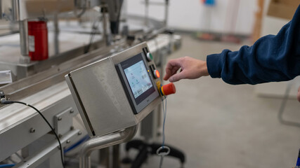 Factory worker man programming closeup