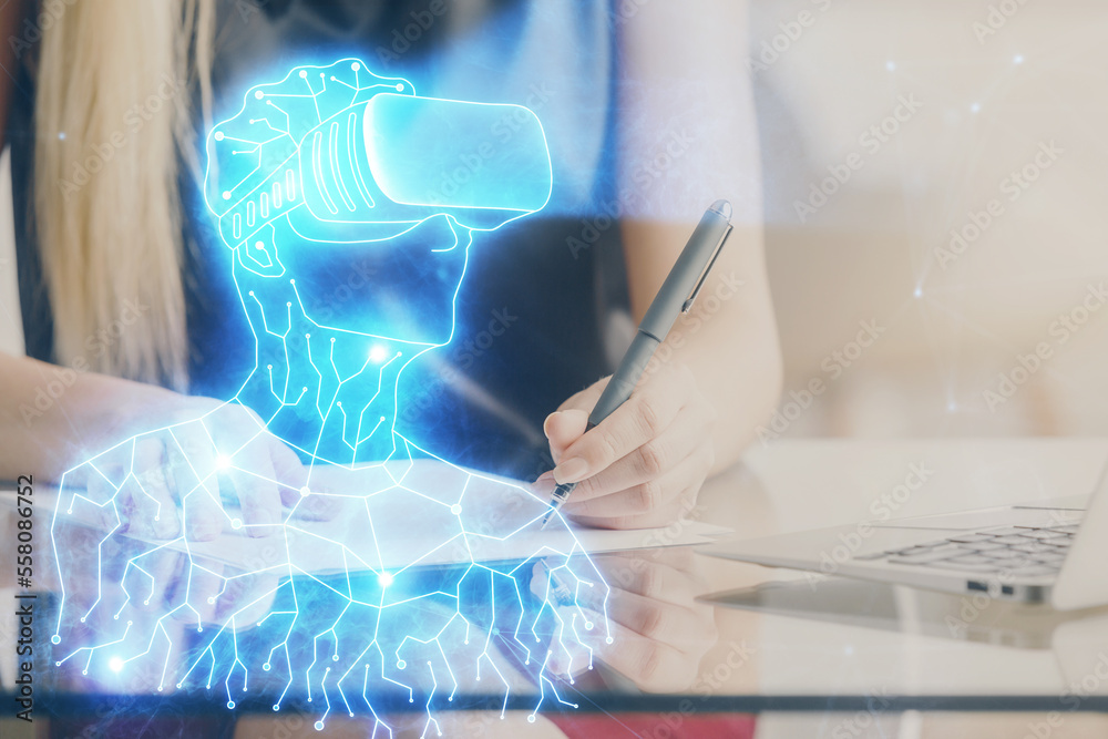 Poster ar hologram over hands taking notes background. concept of augmented reality. double exposure