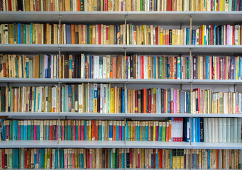 a close-up of a library with many books