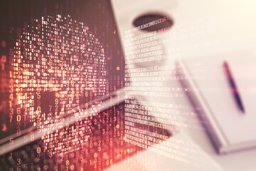 Creative concept of code skull illustration on modern laptop background. Hacking and phishing concept. Multiexposure