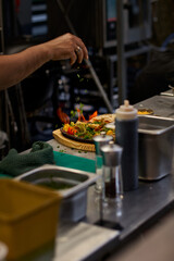 Traditional Mexican beef fajitas on fire in the kitchen, also called alambre