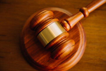 Business and lawyers discussing contract papers with brass scale on desk in office. Law, legal...