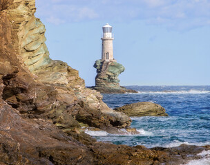 Tourlitis lighthouse in andros island, greece
