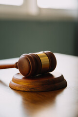 Obraz premium Business and lawyers discussing contract papers with brass scale on desk in office. Law, legal services, advice, justice and law concept picture with film grain effect
