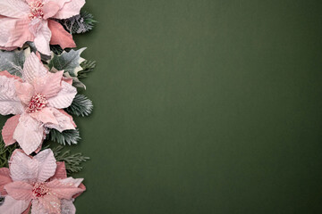 Pink flowers on a green background viewed from above. Top view