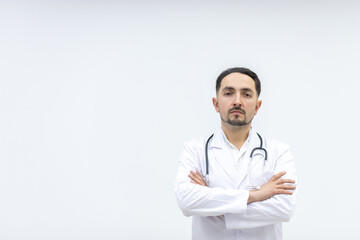Fototapeta premium Close up photo of male mature doctor posing at camera with a stethoscope.