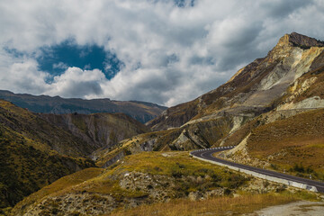 Winding road in the Dagestan Mountains with big mountain formation