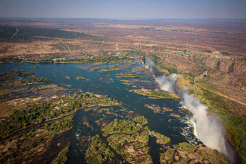 view of huge canyon in Africa with wide river - obrazy, fototapety, plakaty