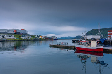 Honningsvag, Norway, 13 August 2022 : The harbor of Honningsvag, considered the northernmost town in the world, a few kilometers down North Cape